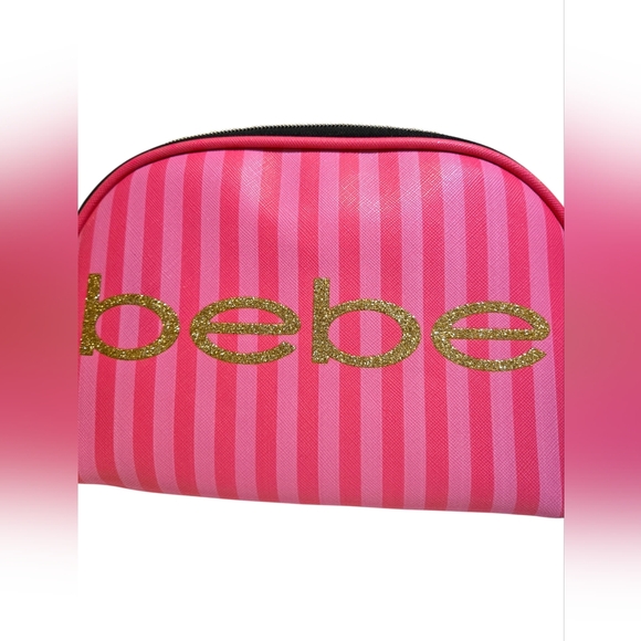 bebe Handbags - Bebe Gold Logo Pink Striped Cosmetic Case